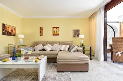 Zona de estar de Bungalow Sun Club OS55 by VillaGranCanaria