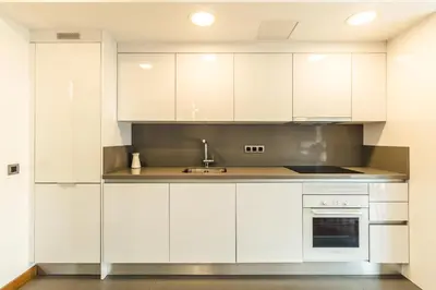 Una cocina o zona de cocina en Taliarte Lighthouse Shared Terrace