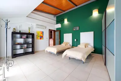 Cama o camas de una habitación en Parralito by VillaGranCanaria