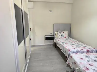 Cama o camas de una habitación en GC BEACH