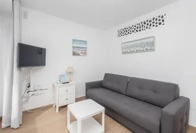 Una televisión o centro de entretenimiento en GuestReady - Alemania Villa-44-B