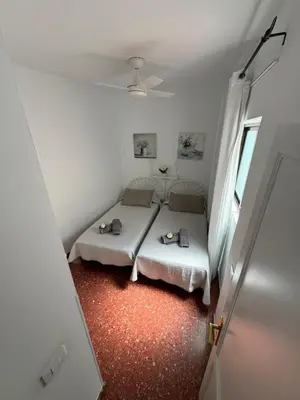 Cama o camas de una habitación en Vivienda Vacacional Tienda Loly
