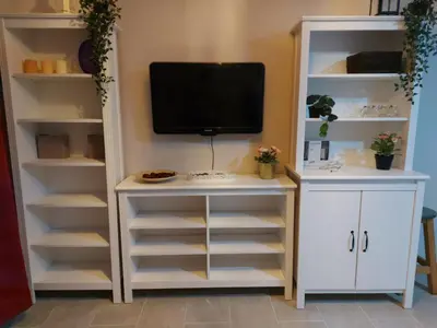 Una televisión o centro de entretenimiento en Bungalow Playmar Maspalomas