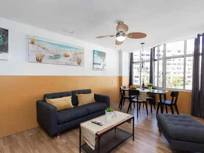 Zona de estar de Breeze Friendly Holiday Home