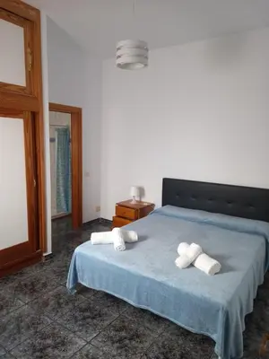 Cama o camas de una habitación en El Girasol