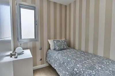 Cama o camas de una habitación en Malibú Canteras Ático 22 con Terraza - Penthouse with Terrace