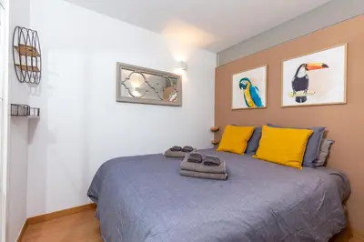 Cama o camas de una habitación en Yumbo Teror Two Bedroom Apartment
