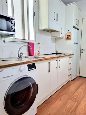 Una cocina o zona de cocina en Comfy Box Las Canteras