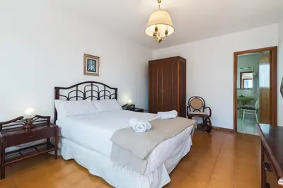 Cama o camas de una habitación en Penthouse Parque Santa Catalina- Ruvimag