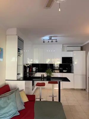 Una televisión o centro de entretenimiento en Playa De Mogan Paraiso
