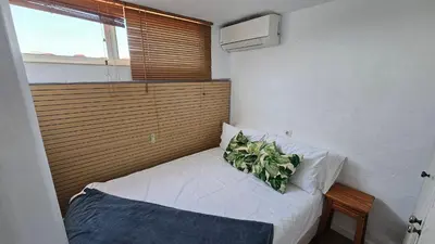 Cama o camas de una habitación en Duplex Walk to Anfi Beach 3 Pools Large Terrace