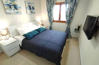 Cama o camas de una habitación en Céntrico apartamento 221 by CASAS COCODRILO