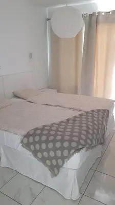 Cama o camas de una habitación en Karin's Beach Loft, Playa del Cura