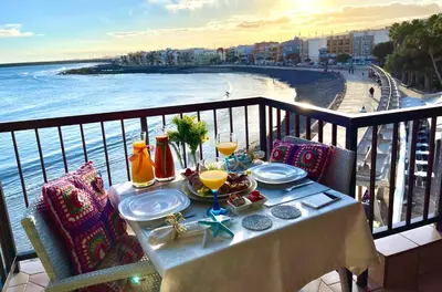 Un balcón o terraza de EmyCanarias Primera Línea De Playa