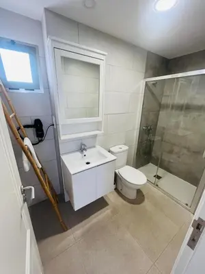 Un baño de La Puntilla Arena