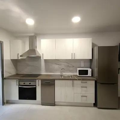 Una cocina o zona de cocina en La Puntilla Arena