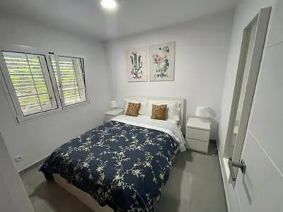 Cama o camas de una habitación en Bungalow silencioso y agradable