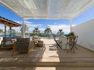 Un balcón o terraza de Pasitoblanco Porto Mare 45 Seaview Villa prívate heated pool