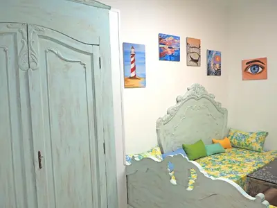 Cama o camas de una habitación en La Luz Vivienda Vacacional
