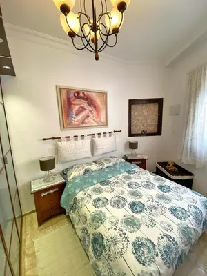 Cama o camas de una habitación en La Luz Vivienda Vacacional