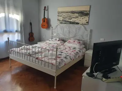Cama o camas de una habitación en Alcaravaneras Home