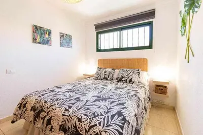 Cama o camas de una habitación en Sunrise View Apartment