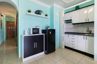 Una cocina o zona de cocina en Sunrise View Apartment