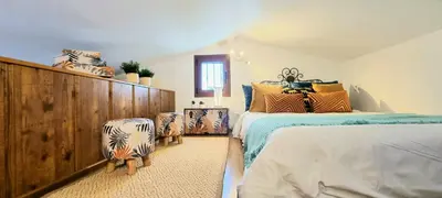 Cama o camas de una habitación en ARGUINEGUIN, BUNGALOWS LOS CANARIOS