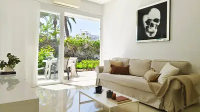 Zona de estar de Bungalow beside the Maspalomas dunes By Pride Holiday Rentals