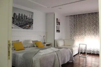 Cama o camas de una habitación en Apartamento Boutique Cruce de Melenara