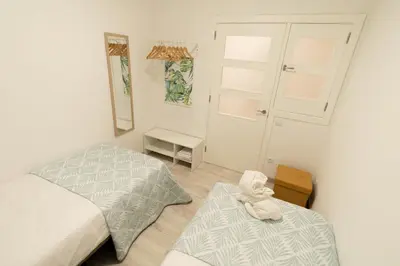 Cama o camas de una habitación en Agüita Surf Lodge