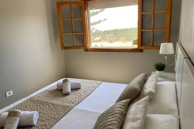 Cama o camas de una habitación en 2 Apartments with private pool at Villa Diaz Aleman