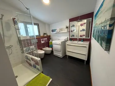 Un baño de Atico bailadero