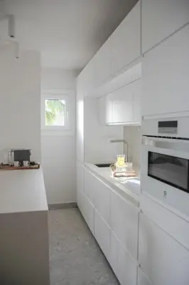 Una cocina o zona de cocina en Agustino Beach Suites San Agustin