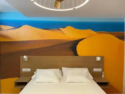 Cama o camas de una habitación en Apartamento Tamaran Sky