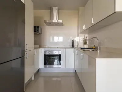 Una cocina o zona de cocina en GuestReady - Nuevos Livian Suites Las Palmas