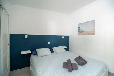 Cama o camas de una habitación en El Nidito