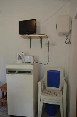 Una televisión o centro de entretenimiento en Casa de Diego y Mela