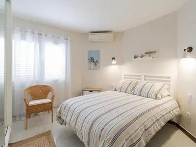 Cama o camas de una habitación en Bungalow Maspalomas Leticia