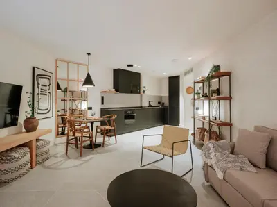Una televisión o centro de entretenimiento en TocToc Suites Olof Palme - Viviendas Vacacionales