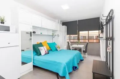 Cama o camas de una habitación en Estudio vacacional W&G Las Canteras con bonitas vistas al mar