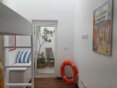 Cama o camas de una habitación en Playa Canteras suites