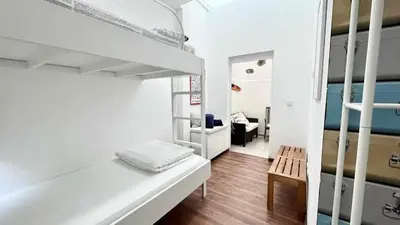 Cama o camas de una habitación en Playa Canteras suites