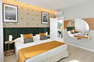 Cama o camas de una habitación en Joviano by VillaGranCanaria