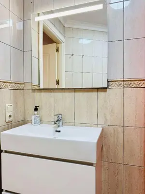 Un baño de 1 Schlafzimmer Ferienwohnung am Strand