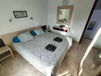 Cama o camas de una habitación en MASPALOMAS GREEN OASIS CLUB playa