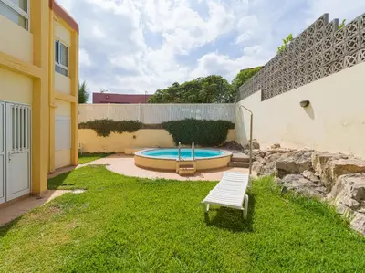 Piscina en o cerca de HomeForGuest Modern Apartment in San Agustin 2 min from the beach