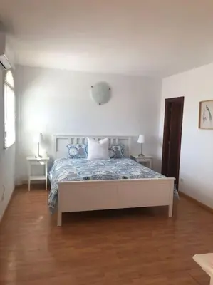 Cama o camas de una habitación en Casa Macken con piscina climatizada y jacuzzi
