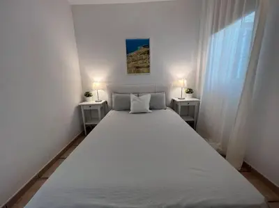 Cama o camas de una habitación en Casa Macken con piscina climatizada y jacuzzi