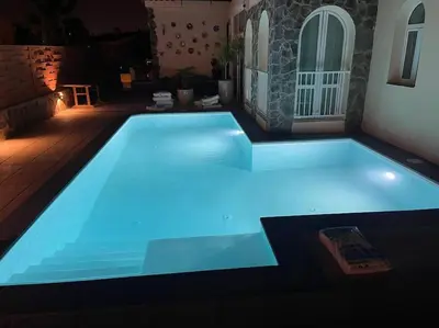 Piscina en o cerca de Casa Macken con piscina climatizada y jacuzzi
